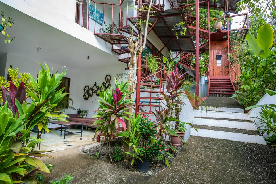 The garden courtyard with the red spiral staircase