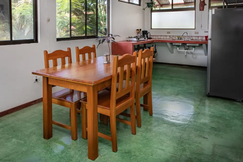 Villa Vista: wooden dining table for six beside the kitchen